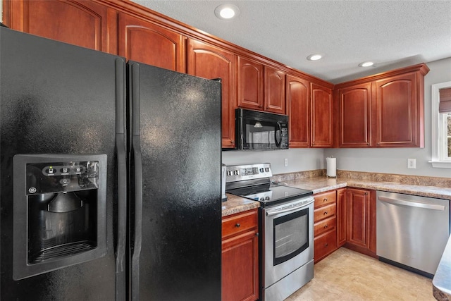 kitchen featuring black appliances, recessed lighting, light countertops, and a textured ceiling