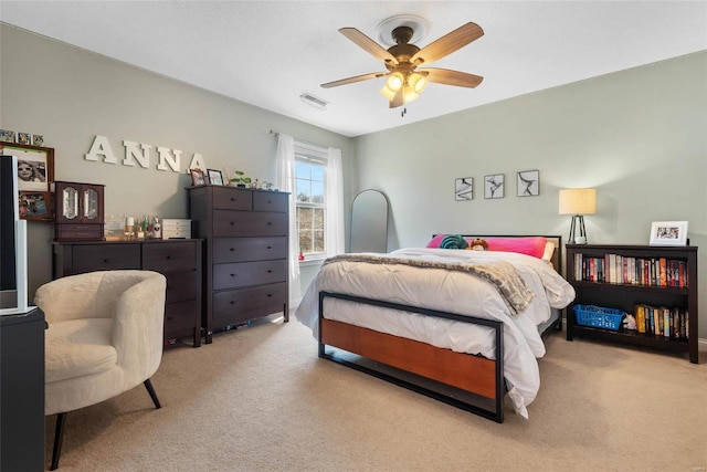 bedroom with carpet flooring and a ceiling fan