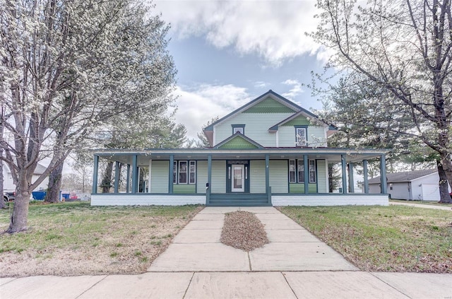 216 S Dickey St, Sparta, IL 62286 - view of front of property featuring covered porch and a front yard