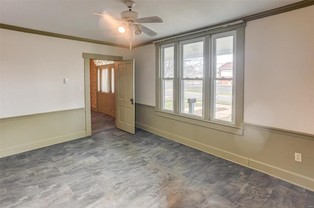 216 S Dickey St, Sparta, IL 62286 - unfurnished room with crown molding, baseboards, and ceiling fan