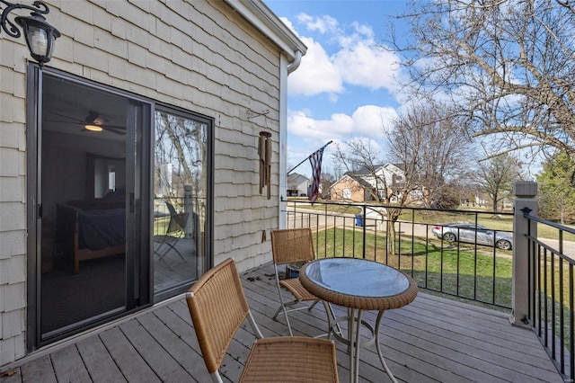deck featuring a lawn