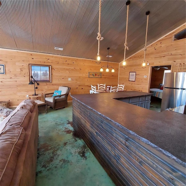 1432 Wayne 523, Wappapello, MO 63966 - interior space with wooden walls, concrete floors, and vaulted ceiling