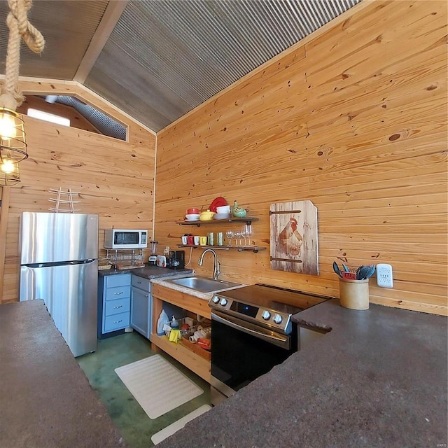 1432 Wayne 523, Wappapello, MO 63966 - kitchen featuring stainless steel appliances, a sink, wood walls, open shelves, and vaulted ceiling