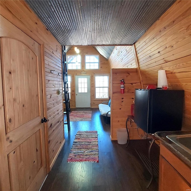 1432 Wayne 523, Wappapello, MO 63966 - additional living space featuring wood walls, dark wood-style flooring, and vaulted ceiling