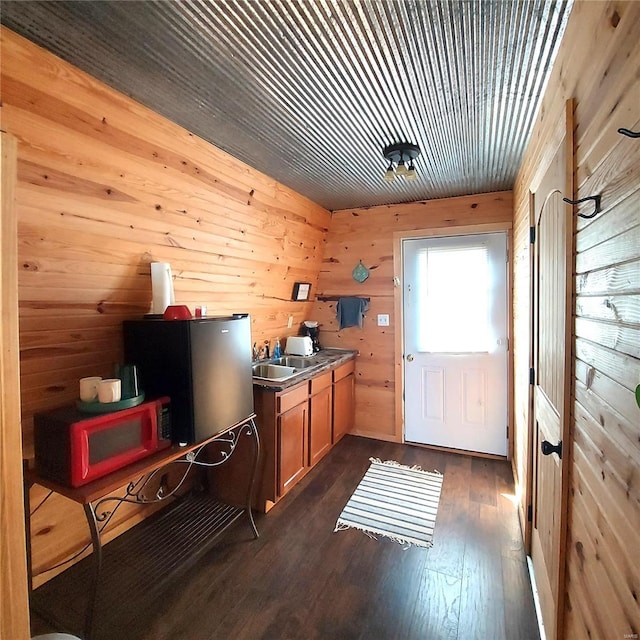 1432 Wayne 523, Wappapello, MO 63966 - entryway featuring a sink, dark wood finished floors, and wooden walls
