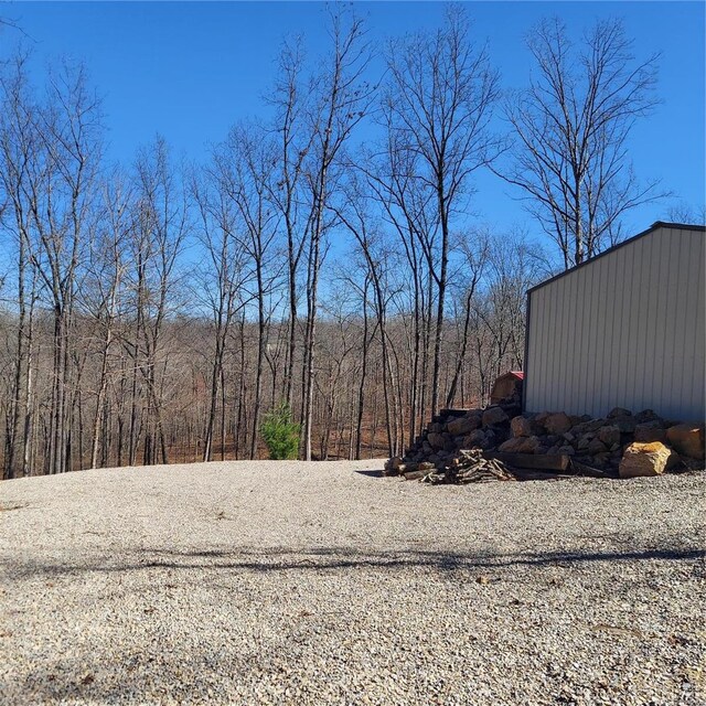 1432 Wayne 523, Wappapello, MO 63966 - view of yard featuring a view of trees and an outdoor structure