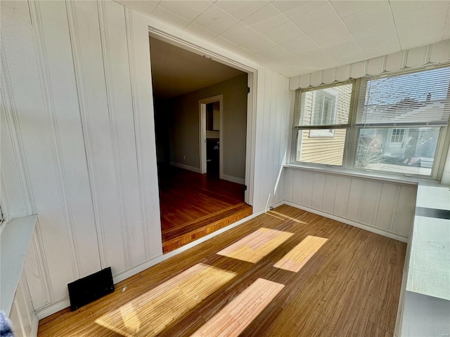 922 S 6th St, Belleville, IL 62220 - empty room featuring wood finished floors and baseboards