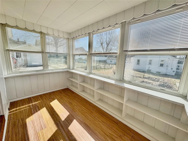 922 S 6th St, Belleville, IL 62220 - unfurnished sunroom with wood finished floors and plenty of natural light