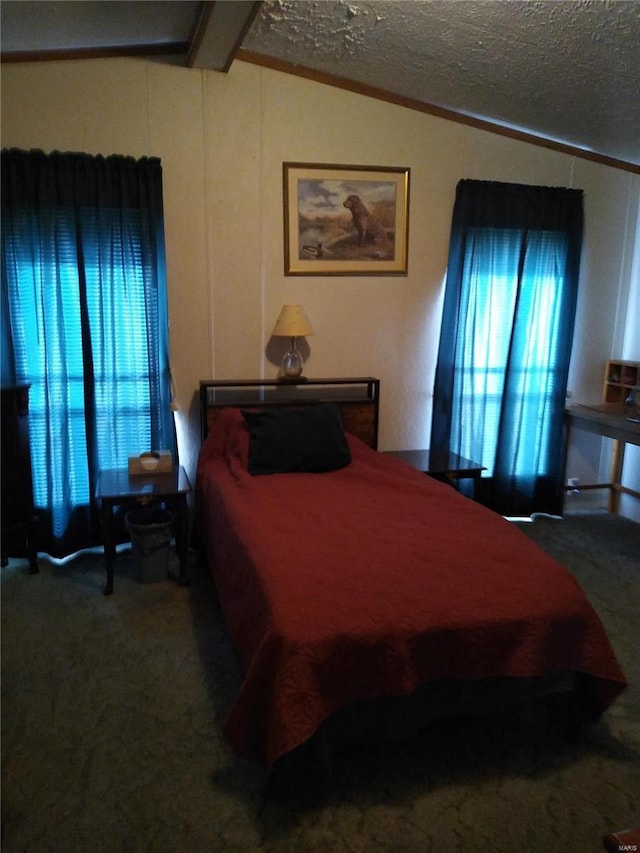 carpeted bedroom featuring vaulted ceiling and crown molding