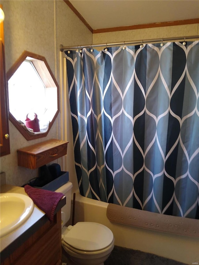 full bathroom with toilet, vanity, crown molding, and shower / bathtub combination with curtain