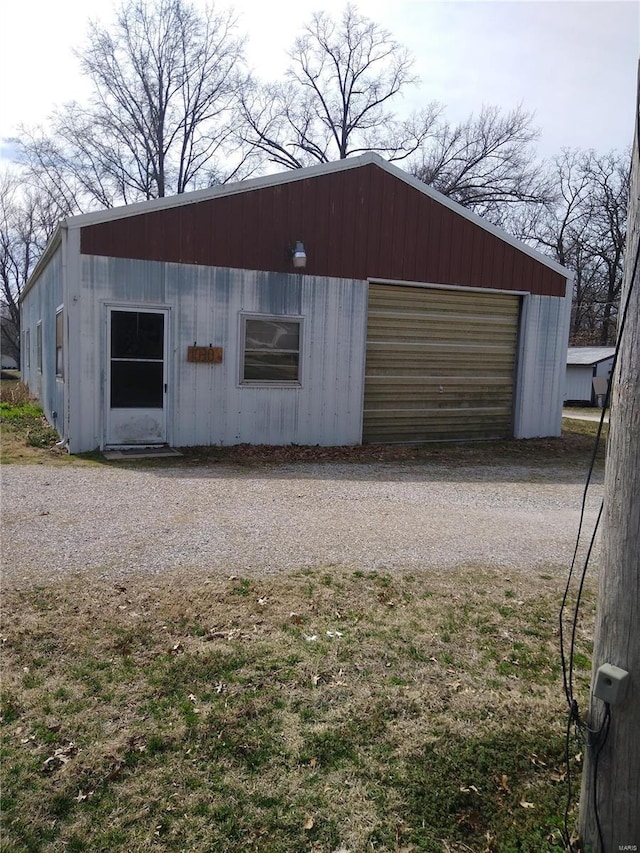 view of outbuilding featuring driveway