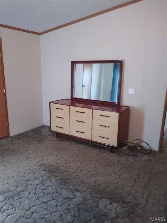 1030 Butler Rd, Tilden, IL 62292 - unfurnished bedroom featuring ornamental molding, dark colored carpet, and lofted ceiling