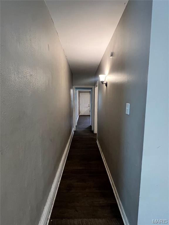 5109 Cote Brilliante Ave, Saint Louis, MO 63113 - corridor with dark wood-style flooring and baseboards