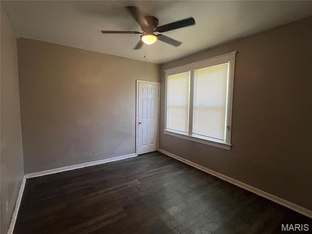 5109 Cote Brilliante Ave, Saint Louis, MO 63113 - spare room with a ceiling fan and dark wood-type flooring