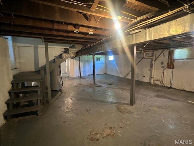 5109 Cote Brilliante Ave, Saint Louis, MO 63113 - below grade area featuring water heater and stairs