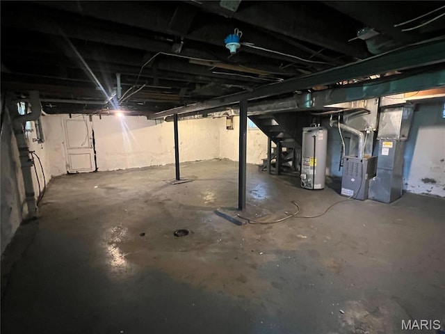 5109 Cote Brilliante Ave, Saint Louis, MO 63113 - unfinished below grade area featuring water heater, stairs, and heating unit
