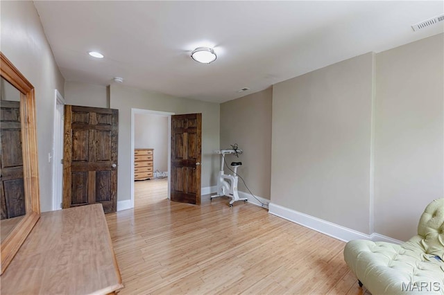 2244 Nebraska Ave, Saint Louis, MO 63104 - living area with light wood finished floors and recessed lighting