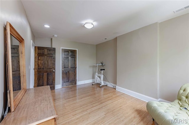 2244 Nebraska Ave, Saint Louis, MO 63104 - living area with wood finished floors and recessed lighting