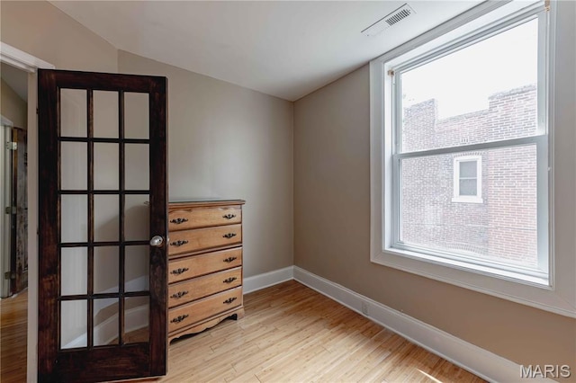 2244 Nebraska Ave, Saint Louis, MO 63104 - unfurnished room with light wood finished floors and vaulted ceiling