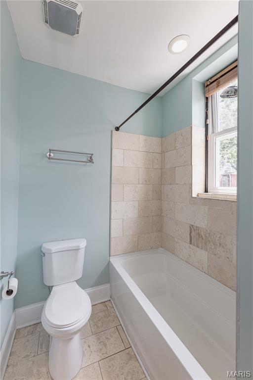 2244 Nebraska Ave, Saint Louis, MO 63104 - full bathroom featuring baseboards and shower / tub combination
