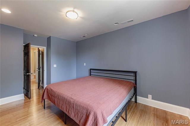 2244 Nebraska Ave, Saint Louis, MO 63104 - bedroom with wood finished floors and recessed lighting