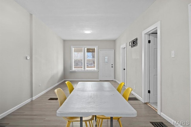 2339 Lincoln Ave, Granite City, IL 62040 - dining area featuring baseboards and light wood-type flooring