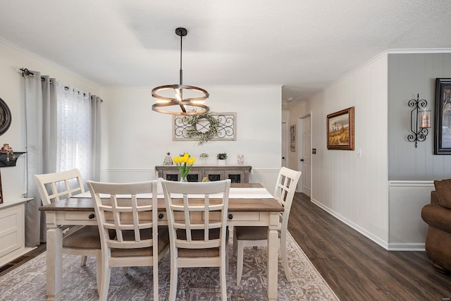 51 County Road 620a, Isabella, MO 65676 - dining area with ornamental molding, dark wood-style flooring, a chandelier, baseboards, and a textured ceiling