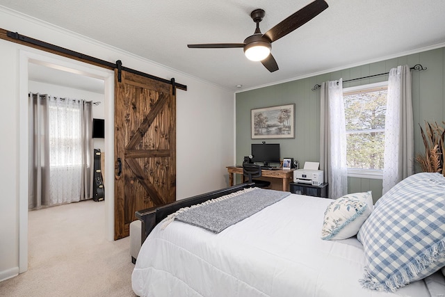 51 County Road 620a, Isabella, MO 65676 - bedroom featuring a barn door, ornamental molding, carpet floors, and ceiling fan