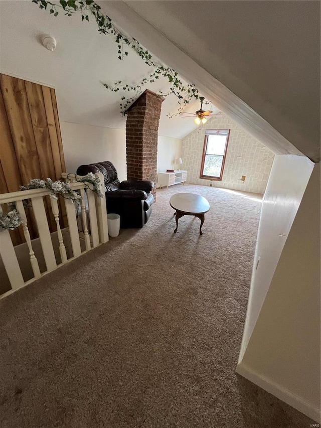 bonus room featuring carpet floors, vaulted ceiling, and a ceiling fan