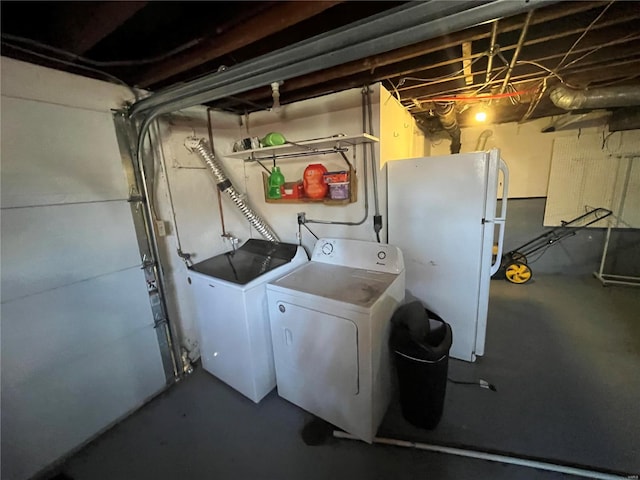 laundry room featuring washing machine and clothes dryer