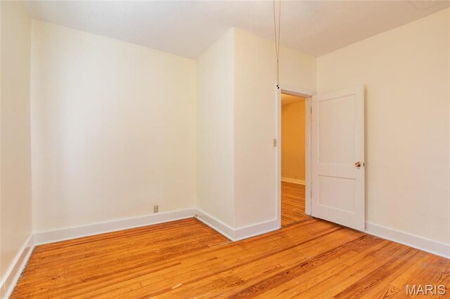 533 Locust St, Carrollton, IL 62016 - empty room featuring light wood finished floors and baseboards