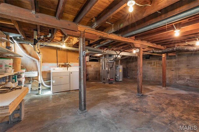 533 Locust St, Carrollton, IL 62016 - unfinished basement with separate washer and dryer, heating unit, gas water heater, and concrete block wall