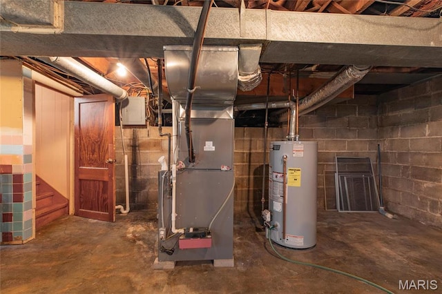 533 Locust St, Carrollton, IL 62016 - utility room featuring water heater and heating unit