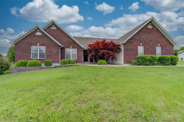 322 Gerard Ln, Moscow Mills, MO 63362 - view of front facade featuring brick siding and a front lawn