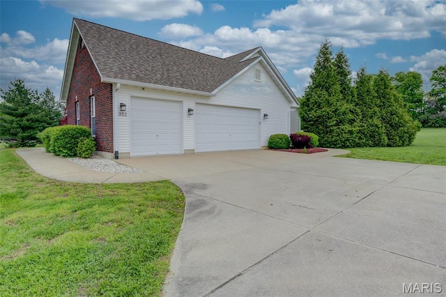 322 Gerard Ln, Moscow Mills, MO 63362 - view of home's exterior with roof with shingles, concrete driveway, a garage, a yard, and brick siding