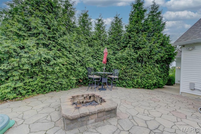 322 Gerard Ln, Moscow Mills, MO 63362 - view of patio / terrace featuring an outdoor fire pit