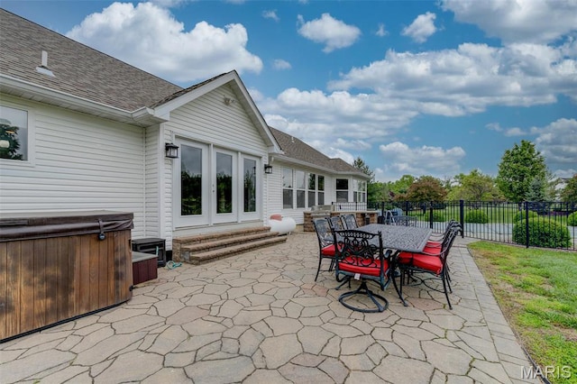 322 Gerard Ln, Moscow Mills, MO 63362 - view of patio with a hot tub, entry steps, and outdoor dining space