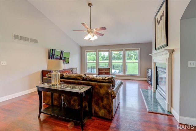 322 Gerard Ln, Moscow Mills, MO 63362 - living area featuring a ceiling fan, wood finished floors, vaulted ceiling, and baseboards