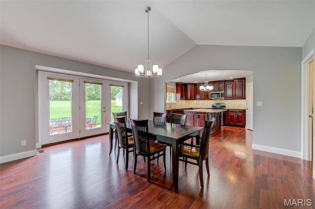 322 Gerard Ln, Moscow Mills, MO 63362 - dining space with a chandelier, lofted ceiling, plenty of natural light, dark wood-style flooring, and baseboards