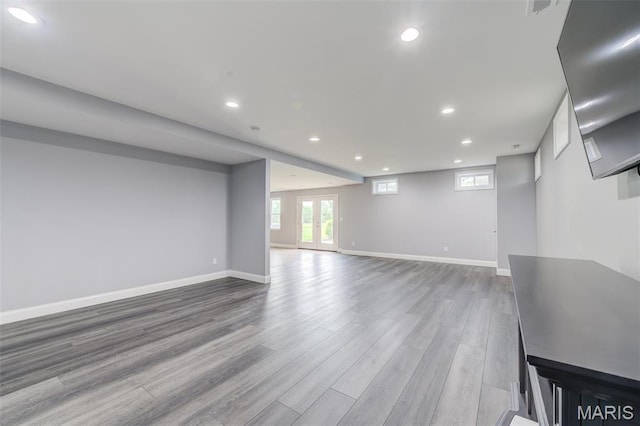 322 Gerard Ln, Moscow Mills, MO 63362 - below grade area featuring recessed lighting, wood finished floors, and baseboards