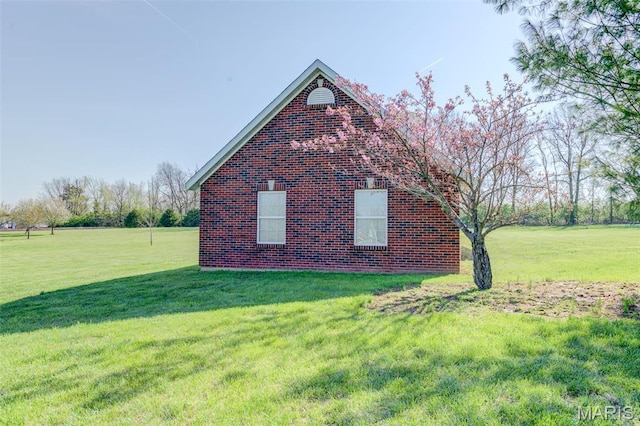 322 Gerard Ln, Moscow Mills, MO 63362 - view of home's exterior with a yard