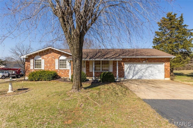 423 Rice Rd, Bonne Terre, MO 63628 - ranch-style house featuring concrete driveway, an attached garage, a front yard, and brick siding