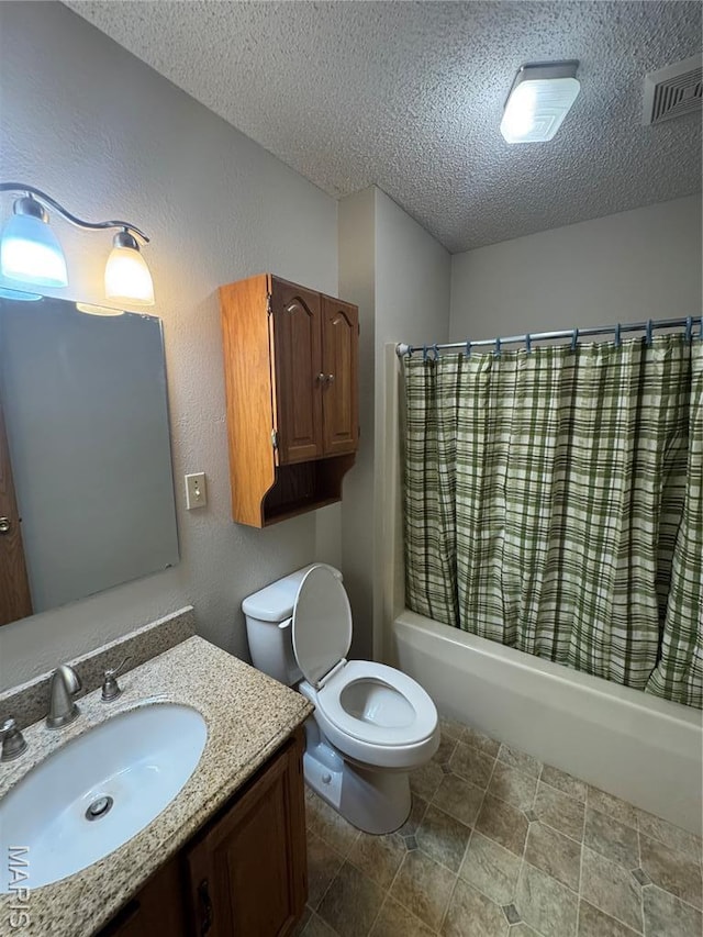 423 Rice Rd, Bonne Terre, MO 63628 - bathroom with shower / tub combo, a textured ceiling, vanity, and toilet