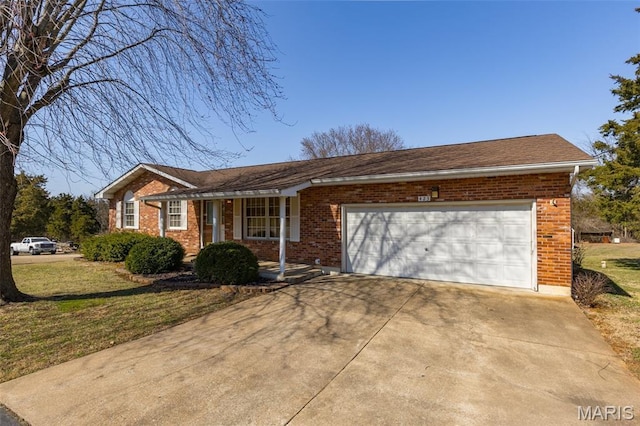 423 Rice Rd, Bonne Terre, MO 63628 - single story home with brick siding, concrete driveway, a garage, and a front yard