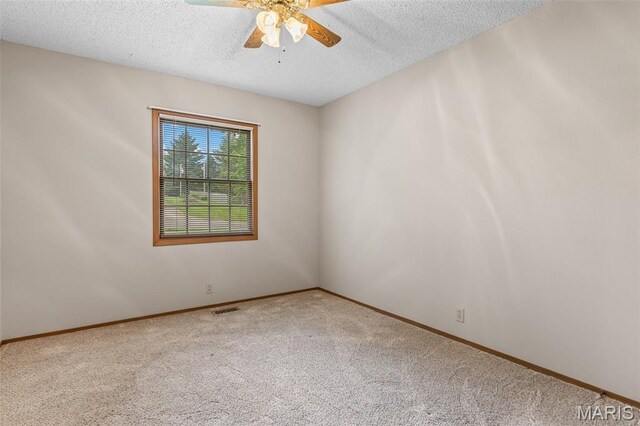 423 Rice Rd, Bonne Terre, MO 63628 - carpeted spare room featuring a ceiling fan, a textured ceiling, and baseboards