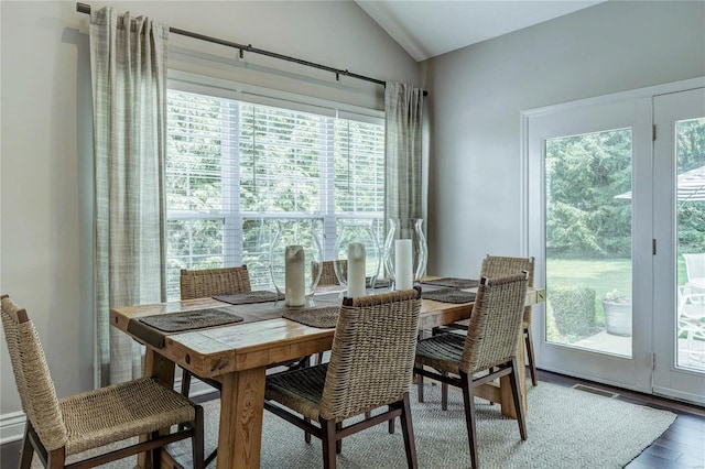1155 Whitmoor Dr, Weldon Spring, MO 63304 - dining area featuring lofted ceiling and wood finished floors
