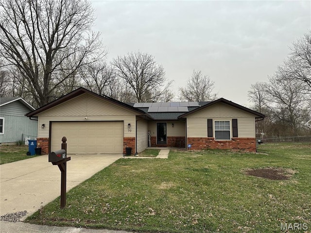 70 Innsbruck Ln, Shiloh, IL 62221 - ranch-style house with brick siding, a garage, concrete driveway, and solar panels