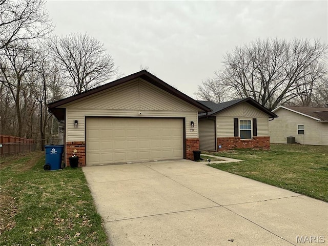 70 Innsbruck Ln, Shiloh, IL 62221 - single story home with brick siding, concrete driveway, and cooling unit