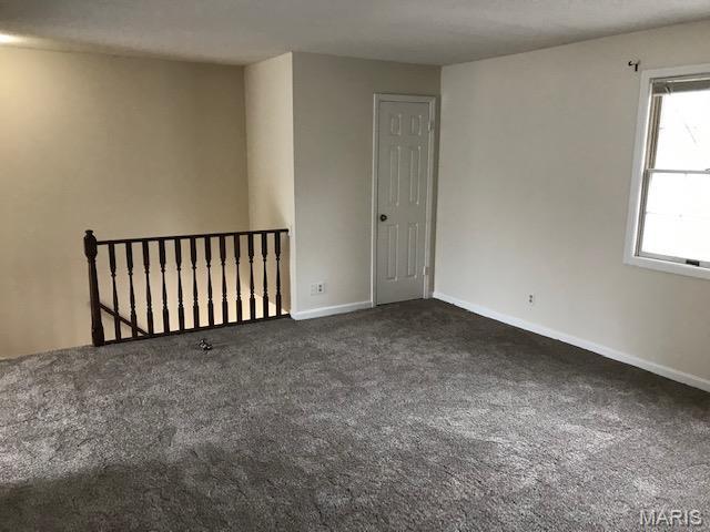 1723 Canary Cv, Brentwood, MO 63144 - empty room featuring carpet flooring and baseboards