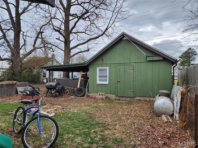 210 Linn St, Belle, MO 65013 - view of property exterior with board and batten siding